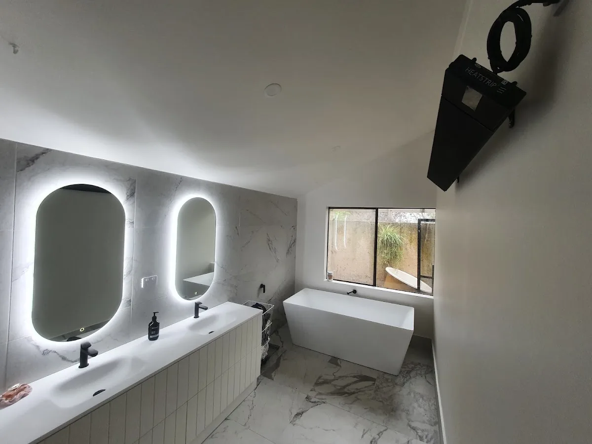 Backlit bathroom mirror lighting
