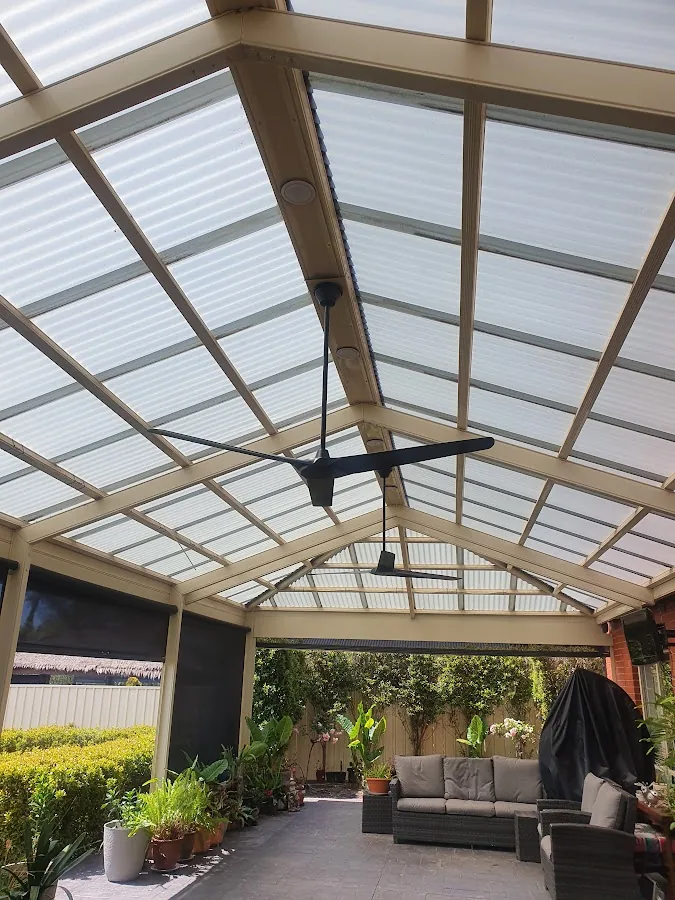Ceiling fan and outdoor lighting under pergola