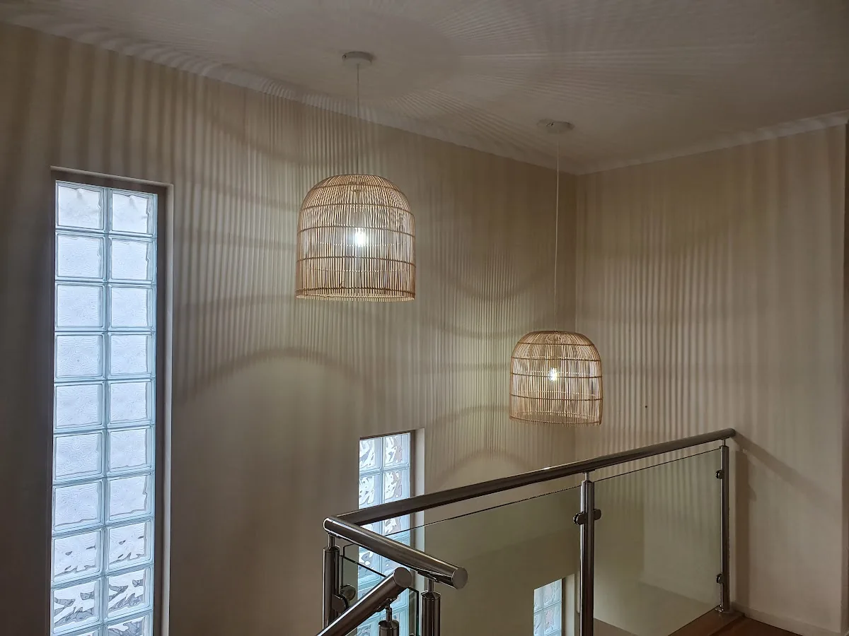 Rattan pendant lights in stairwell